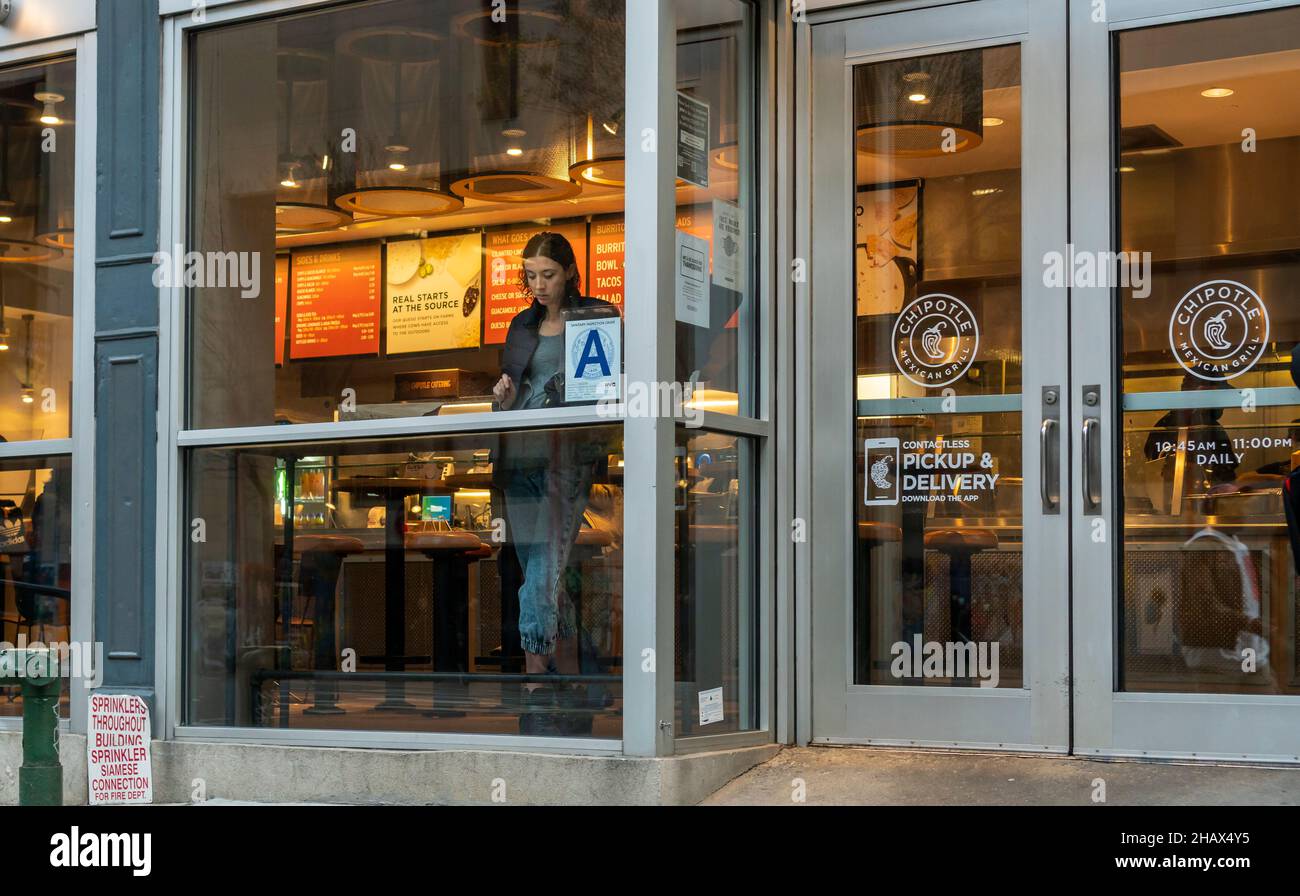 A Chipotle Mexican Grill restaurant in the Chelsea neighborhood of New York on Monday, December 6, 2021. (© Richard B. Levine) Stock Photo