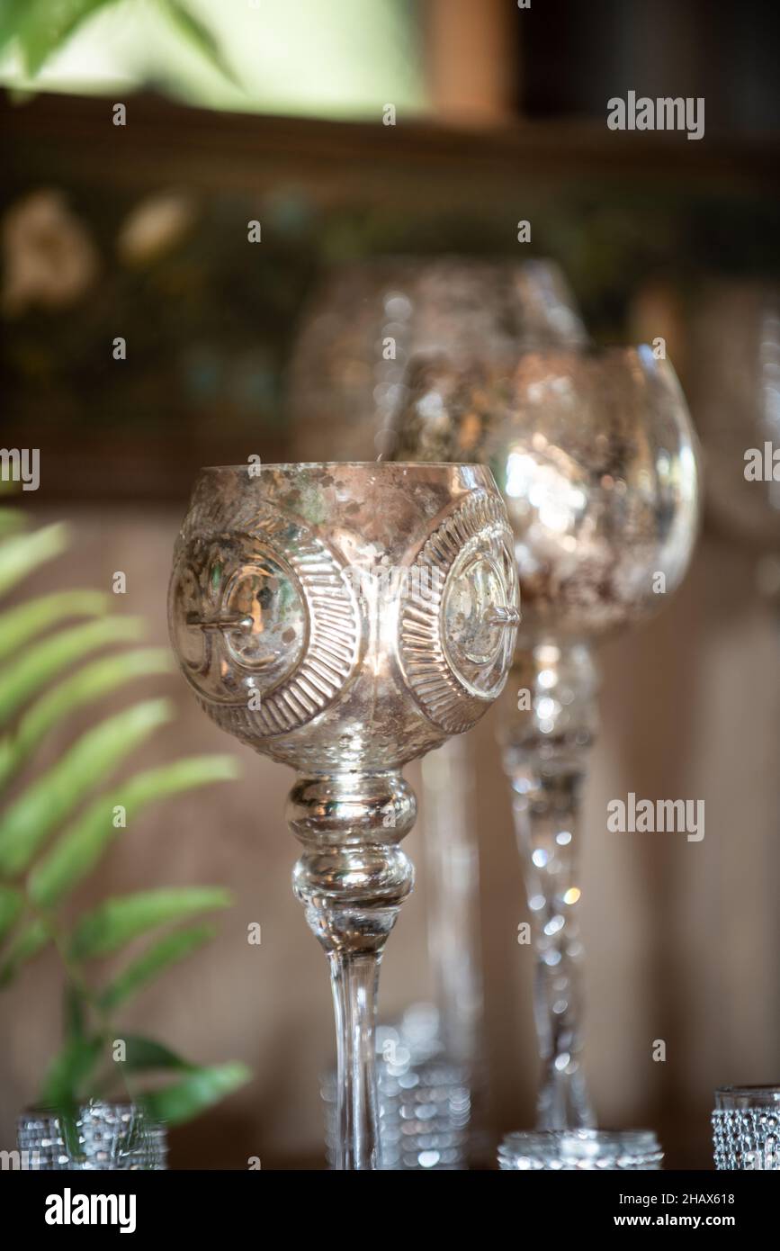 Ornate silver long candle holders Stock Photo Alamy