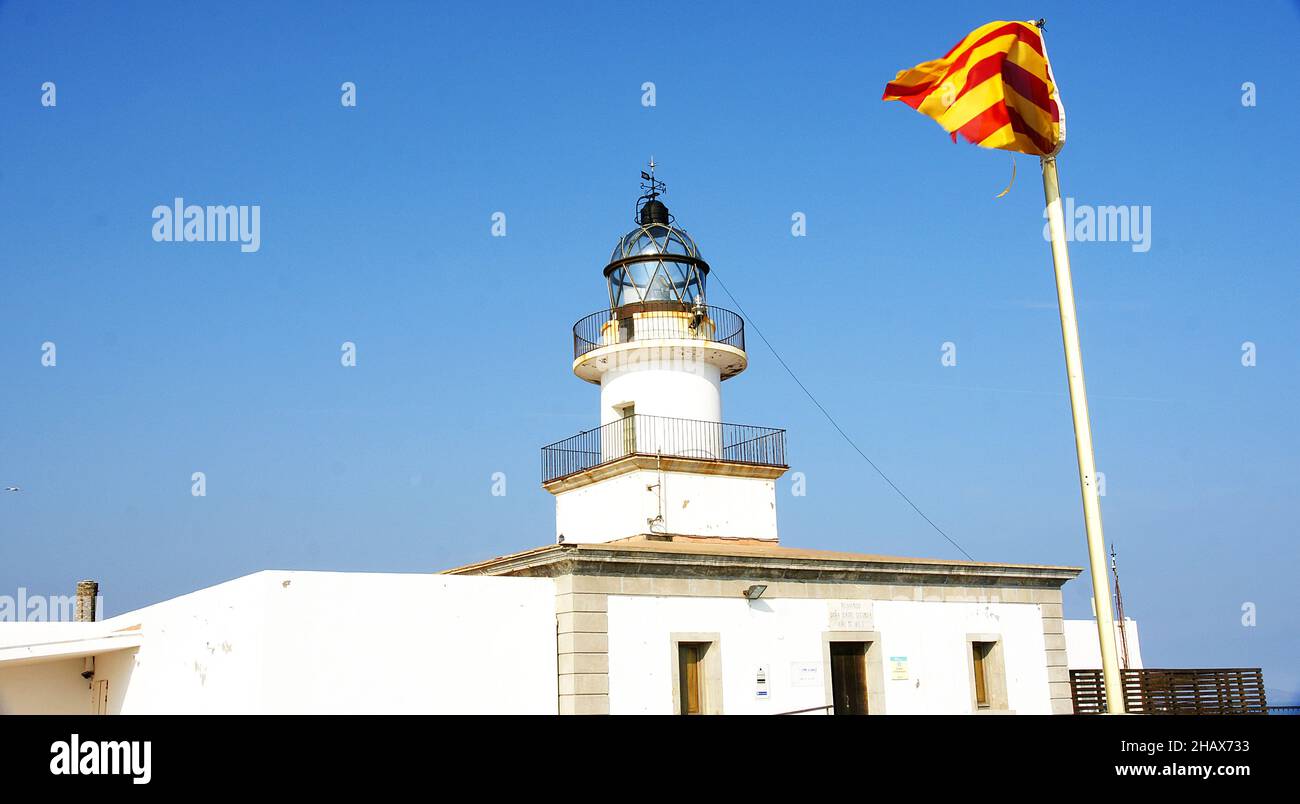 Cap de Creus lighthouse with Catalan flag, Girona, Costa Brava