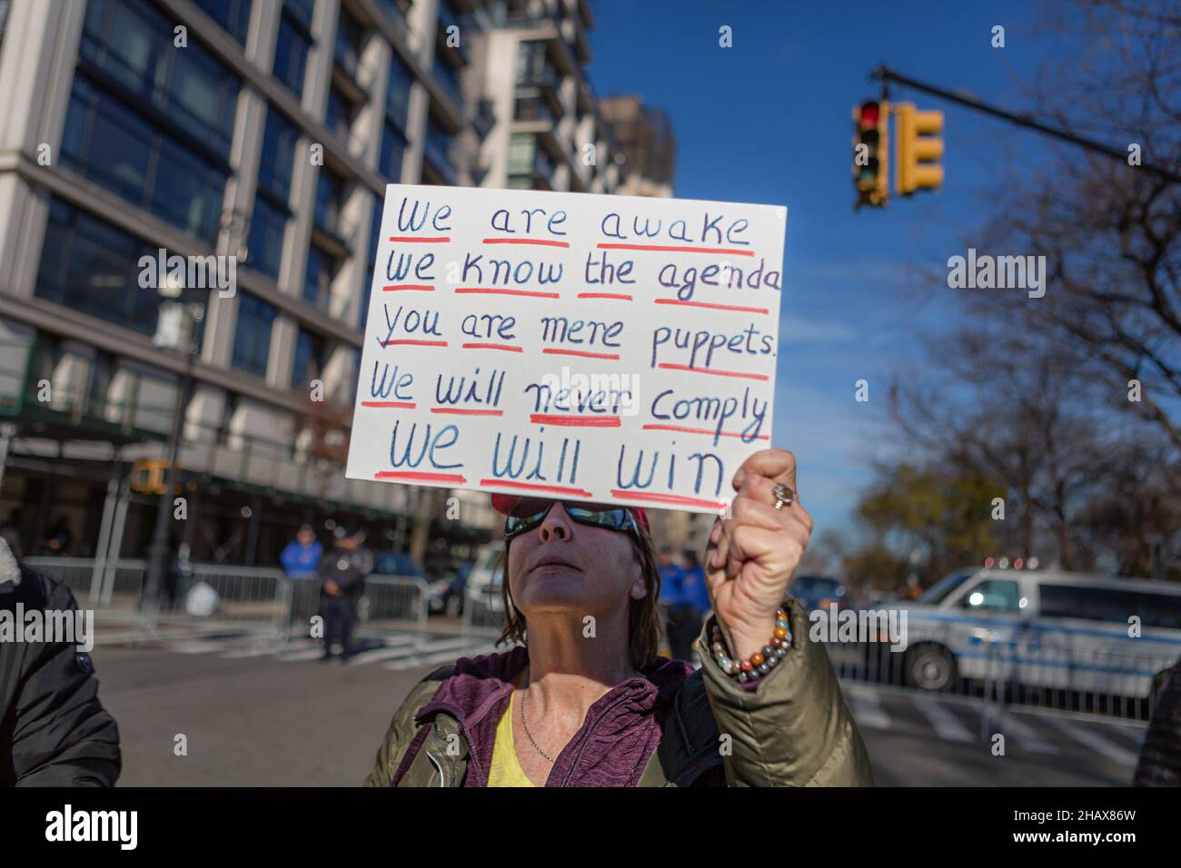 New York, New York, USA. 14th Dec, 2021. Dozens of antivax proponents rallied against a NYC mandate requiring all private-sector workers to show proof of two vaccine doses. The vaccine expansion is set to take place on December 27, just days before Mayor Bill de Blasio leaves office. The mandate will apply to workers at about 184,000 businesses. (Credit Image: © Michael Nigro/Pacific Press via ZUMA Press Wire) Stock Photo