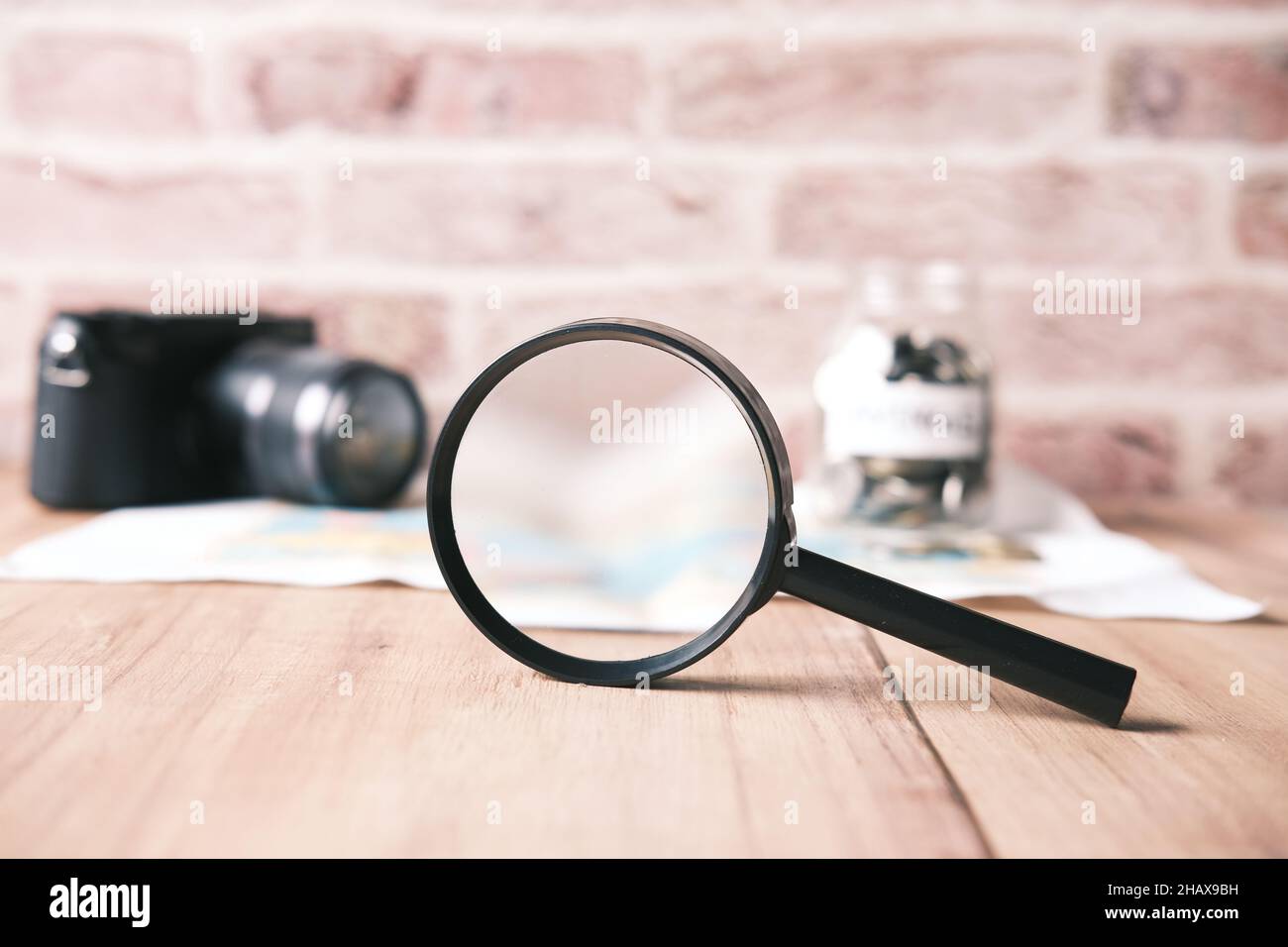 Magnifying glass and map hi-res stock photography and images - Alamy