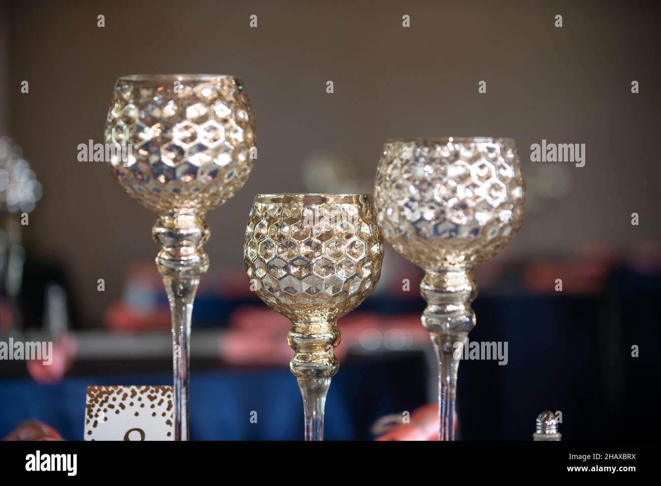 Three glass candle holder centerpiece Stock Photo Alamy