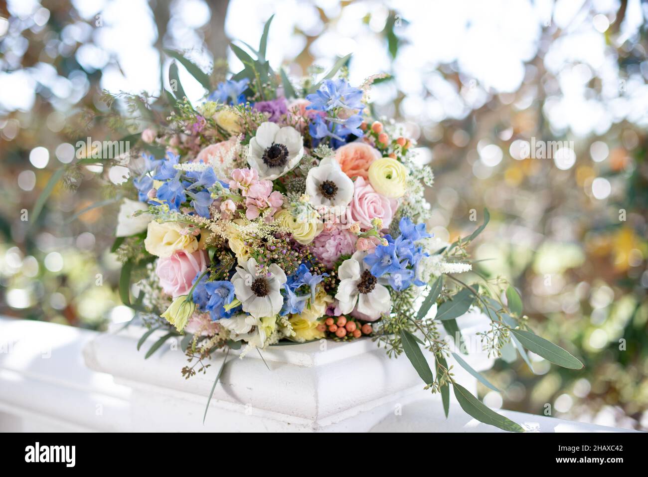 Brides bouquet with pink, white, blue and yellow flowers Stock Photo