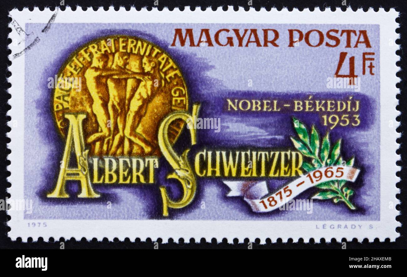 HUNGARY - CIRCA 1975: a stamp printed in the Hungary shows Nobel Peace Prize Medal, Dr. Albert Schweitzer, Medical Missionary and Musician, circa 1975 Stock Photo