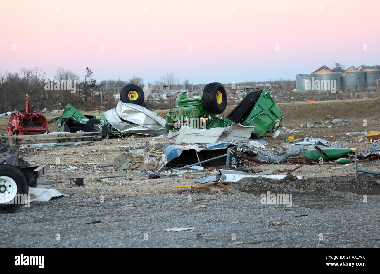 Mayfield, United States Of America. 12th Dec, 2021. Mayfield, United States of America. 12 December, 2021. Farm machinery is scattered and destroyed in the aftermath of devastating tornadoes that swept across four states destroying buildings and killing dozens December 12, 2021 in Mayfield, Kentucky. Credit: S1C Benjamin Crane/U.S. Army/Alamy Live News Stock Photo