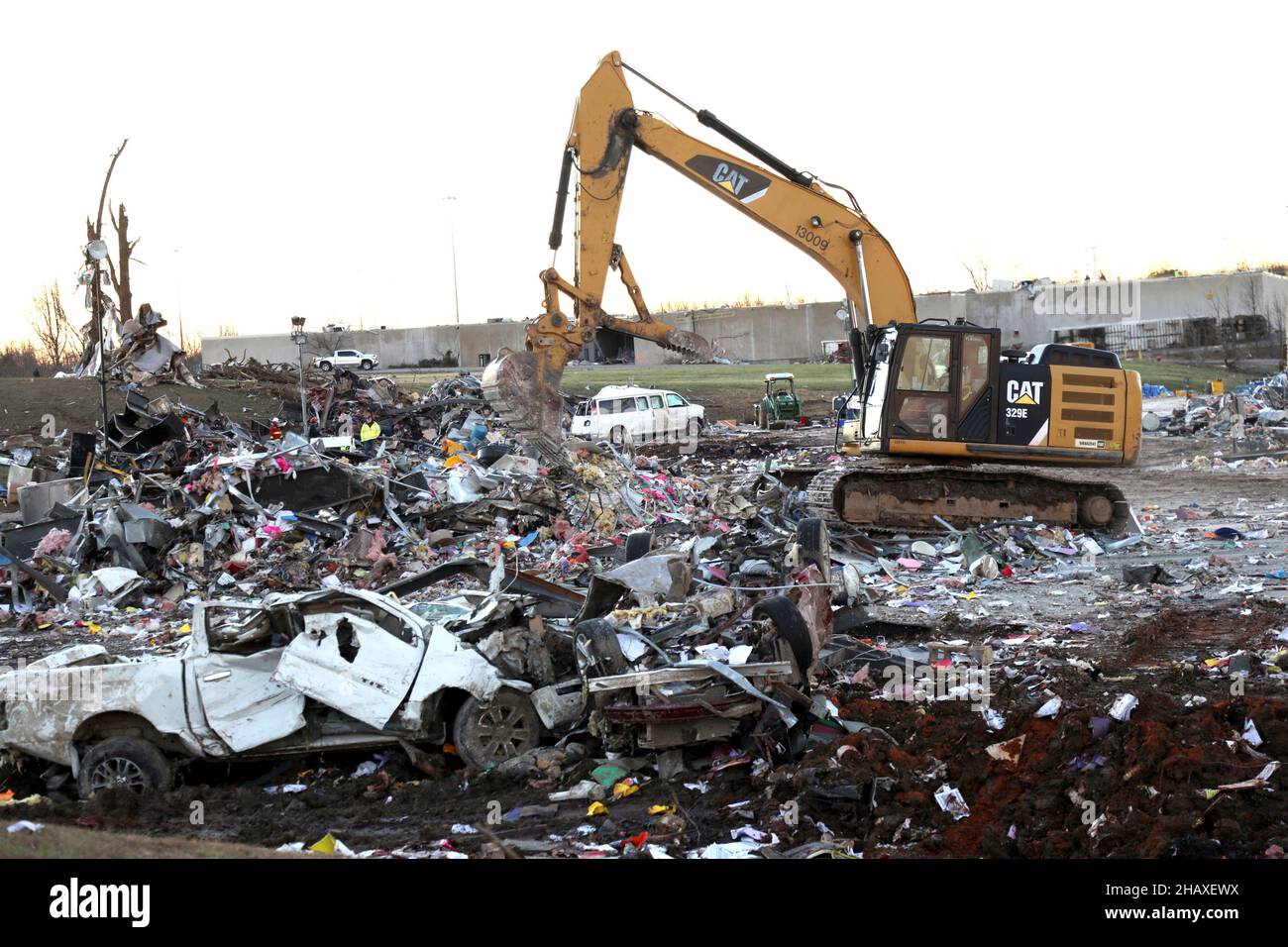 Mayfield, United States Of America. 12th Dec, 2021. Mayfield, United States of America. 12 December, 2021. Homes and vehicles lay scattered, destroyed by devastating tornadoes that swept across four states destroying buildings and killing dozens December 12, 2021 in Mayfield, Kentucky. Credit: S1C Benjamin Crane/U.S. Army/Alamy Live News Stock Photo