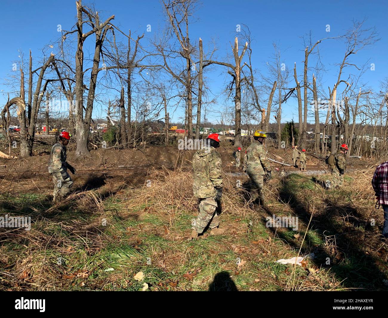 Mayfield, United States Of America. 15th Dec, 2021. Mayfield, United States of America. 15 December, 2021. U.S. Army National Guardsmen assist in clearing debris in the aftermath of devastating tornadoes that swept across four states destroying buildings and killing dozens December 15, 2021 in Mayfield, Kentucky. Credit: S1C Benjamin Crane/U.S. Army/Alamy Live News Stock Photo