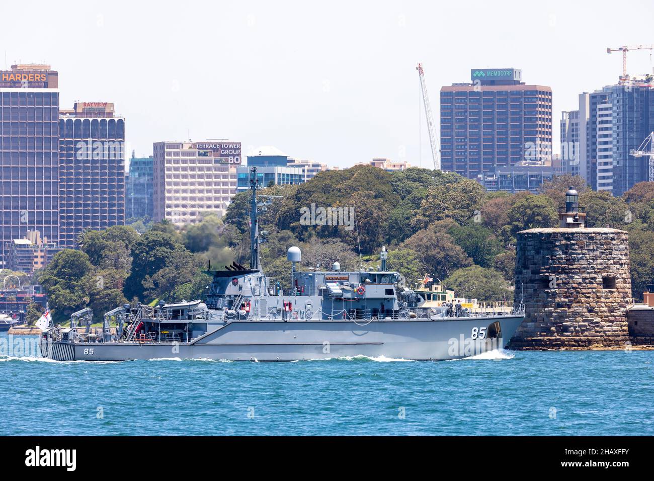 HMAS Gascoyne passes by Fort Denison on Sydney Harbour,NSW,Australia Stock Photo