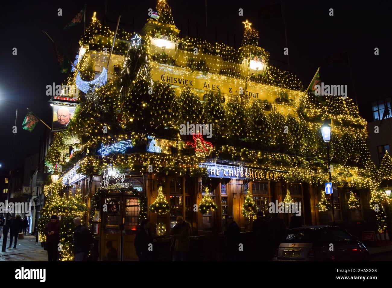 Thousands of Christmas ornaments adorn bar