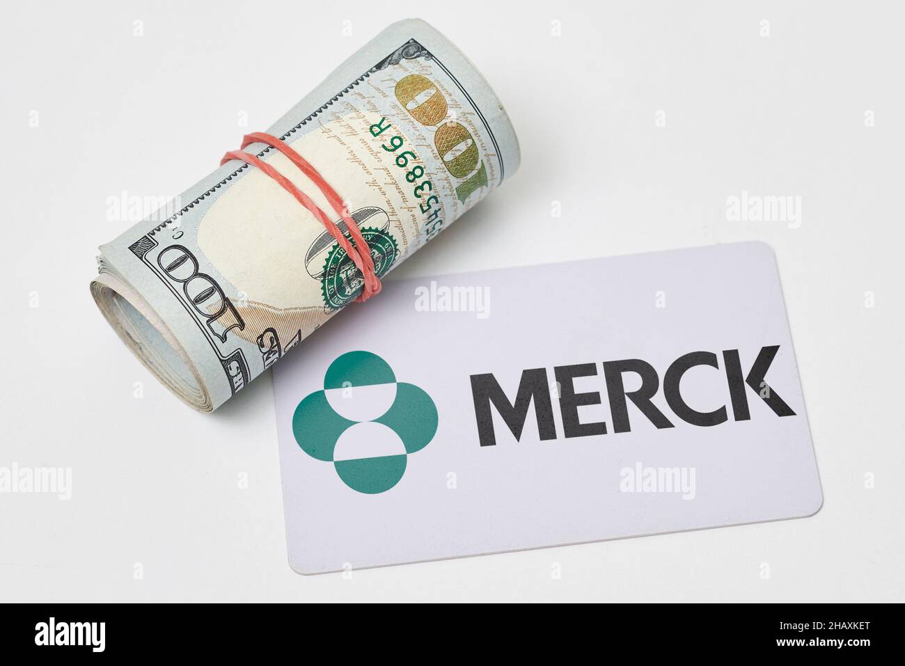 Tashkent, Uzbekistan - 22 November, 2021: Pile of us dollars and Merck ...