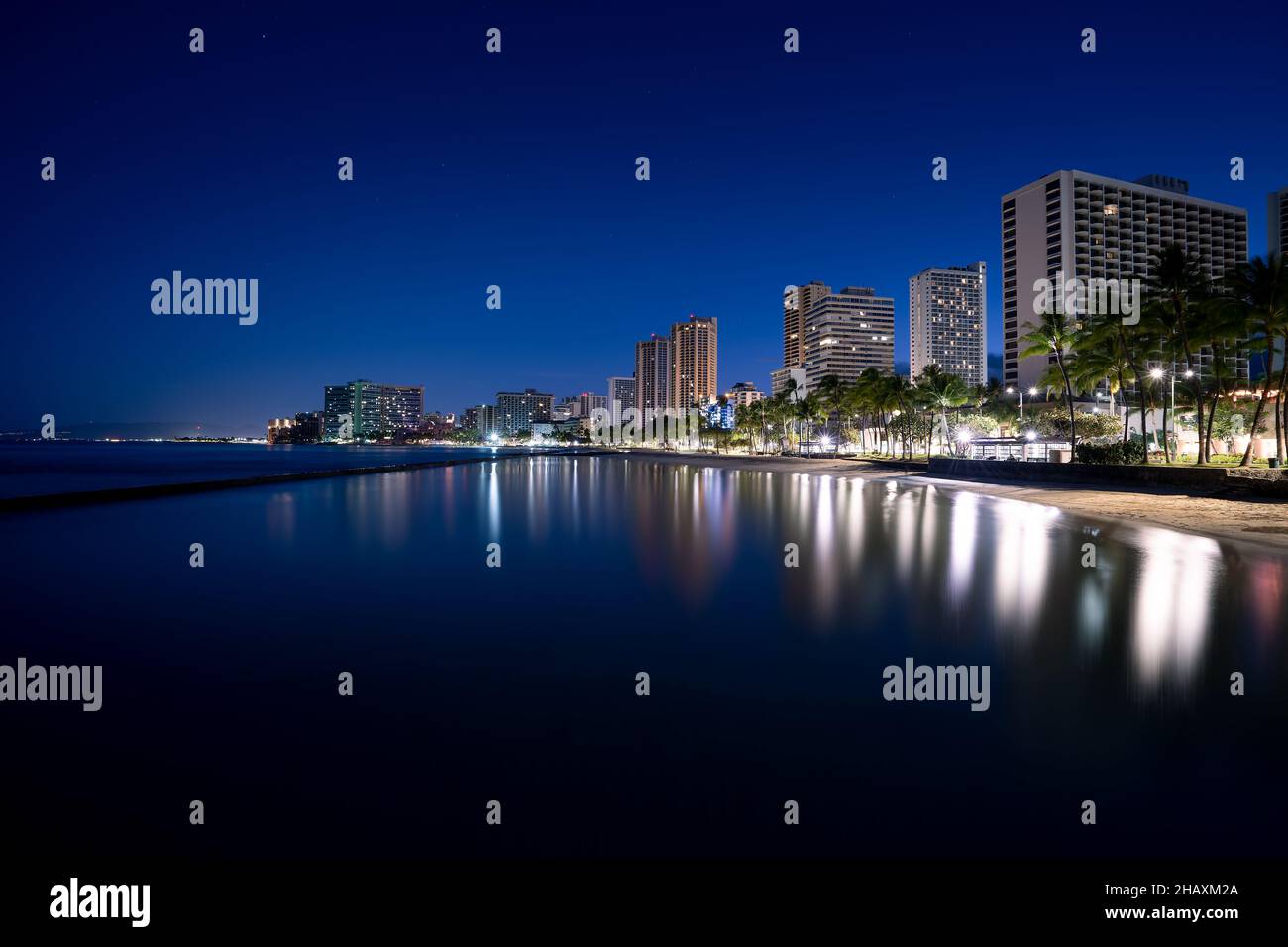 Cityscape and Waikiki Beach at sunrise, Honolulu, Oahu, Hawaii, USA Stock Photo