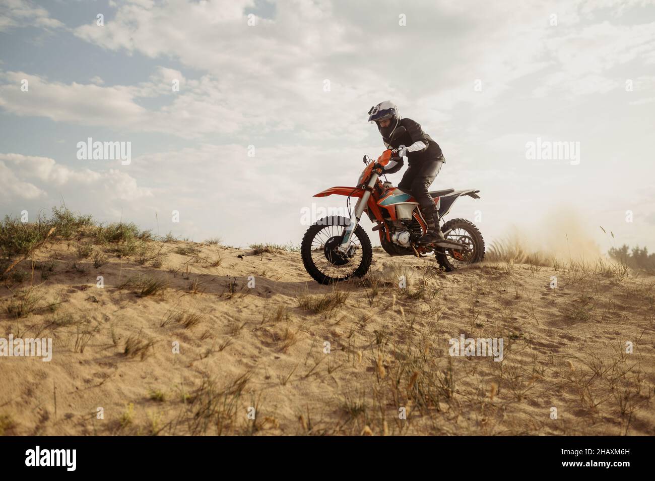 Professional speed rider driving in motocross race Stock Photo - Alamy