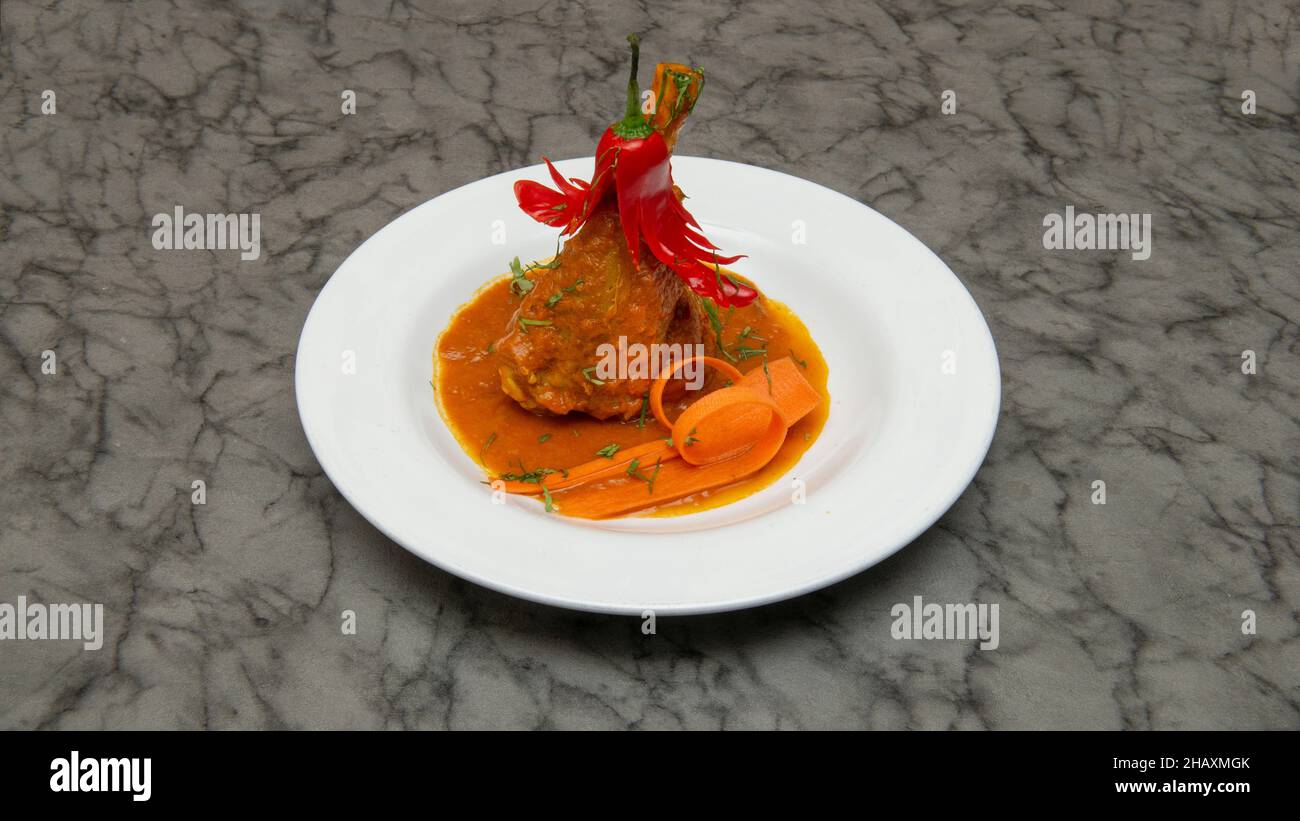 Lamb shank Indian food Stock Photo - Alamy