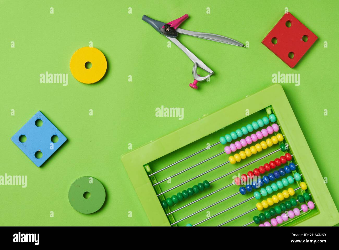 Math for kids. Various ecofriendly toy figures and bead counter for