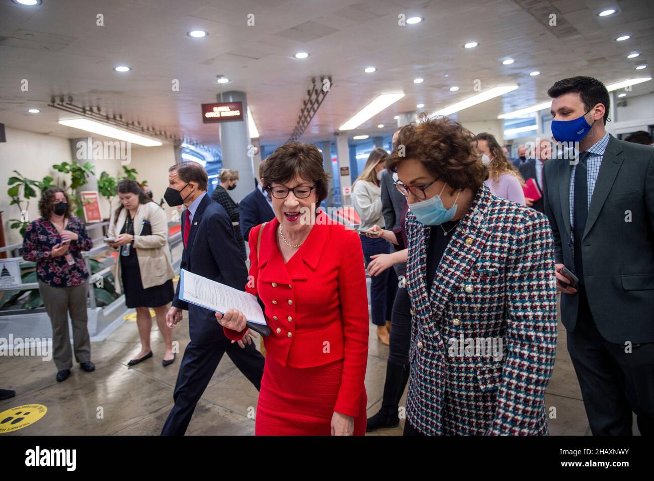 United States Senator Susan Collins (Republican of Maine), left, and United States Senator Jacky Rosen (Democrat of Nevada) make their way through the Senate subway during a vote at the US Capitol in Washington, DC, Wednesday, December 15, 2021. Credit: Rod Lamkey/CNP /MediaPunch Stock Photo