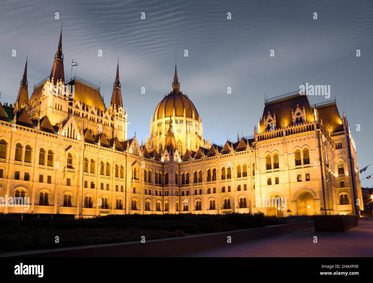 Illuminated Hungarian Parliament building at night Stock Photo