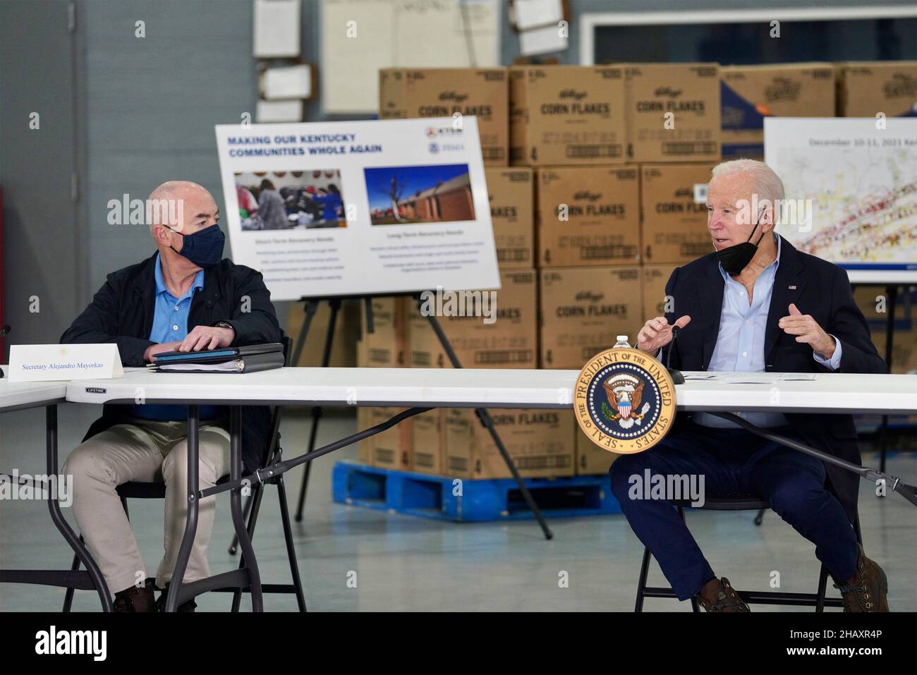 Mayfield, United States Of America. 15th Dec, 2021. Mayfield, United States of America. 15 December, 2021. U.S. President Joe Biden, right, comments as Secretary of Homeland Security Alejandro Mayorkas looks on during a briefing on the recent devastating tornados at the Mayfield Graves County Airport December 15, 2021 in Mayfield, Kentucky. Credit: Alexis Hall/FEMA/Alamy Live News Stock Photo