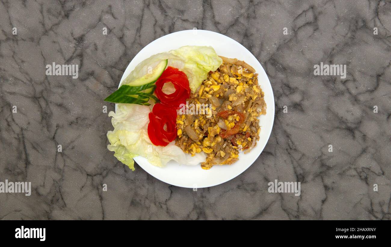 Ackee & swordfish Jamaican & West Indian Food Stock Photo