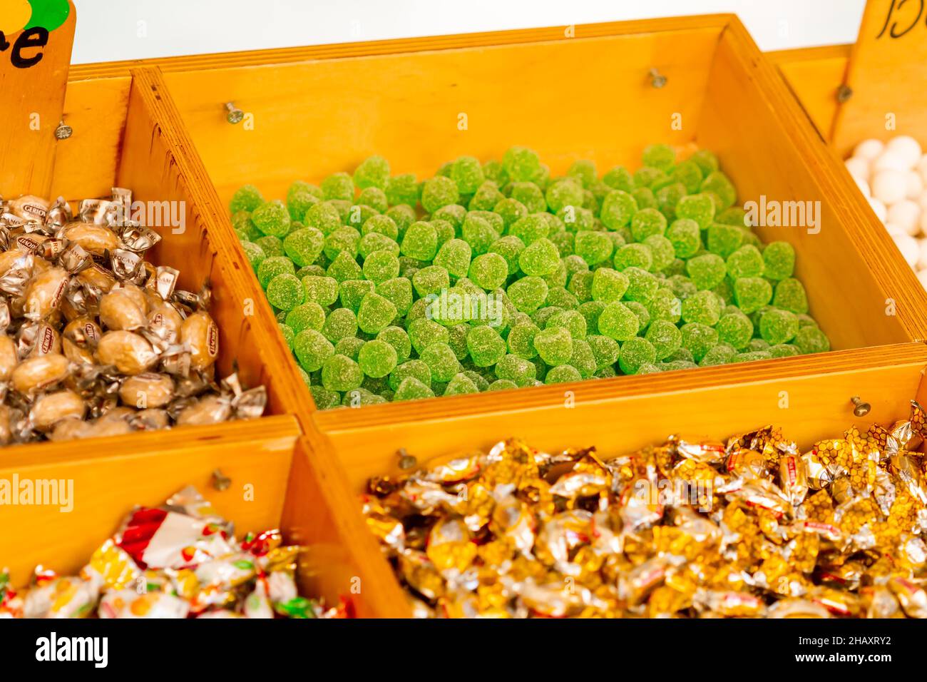 Lot of different sweet candies in wooden boxes Stock Photo - Alamy