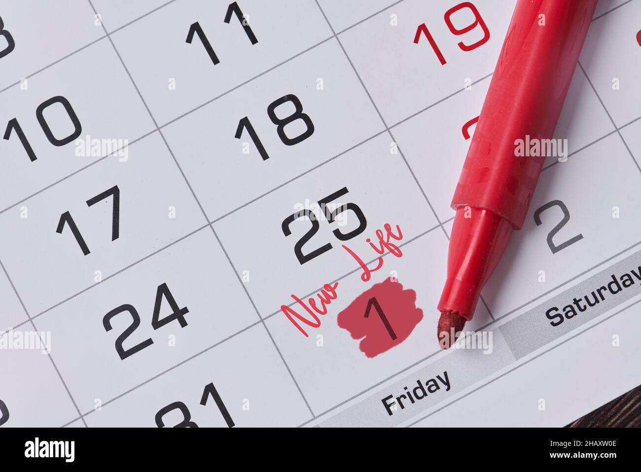 Starting new life. 1st day marked on monthly calendar. Beginning new life Stock Photo