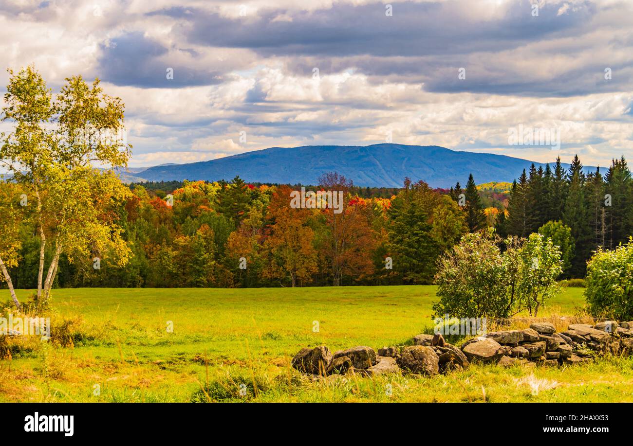 Fall foliage light up the landscape in the Vermont countryside Stock Photo
