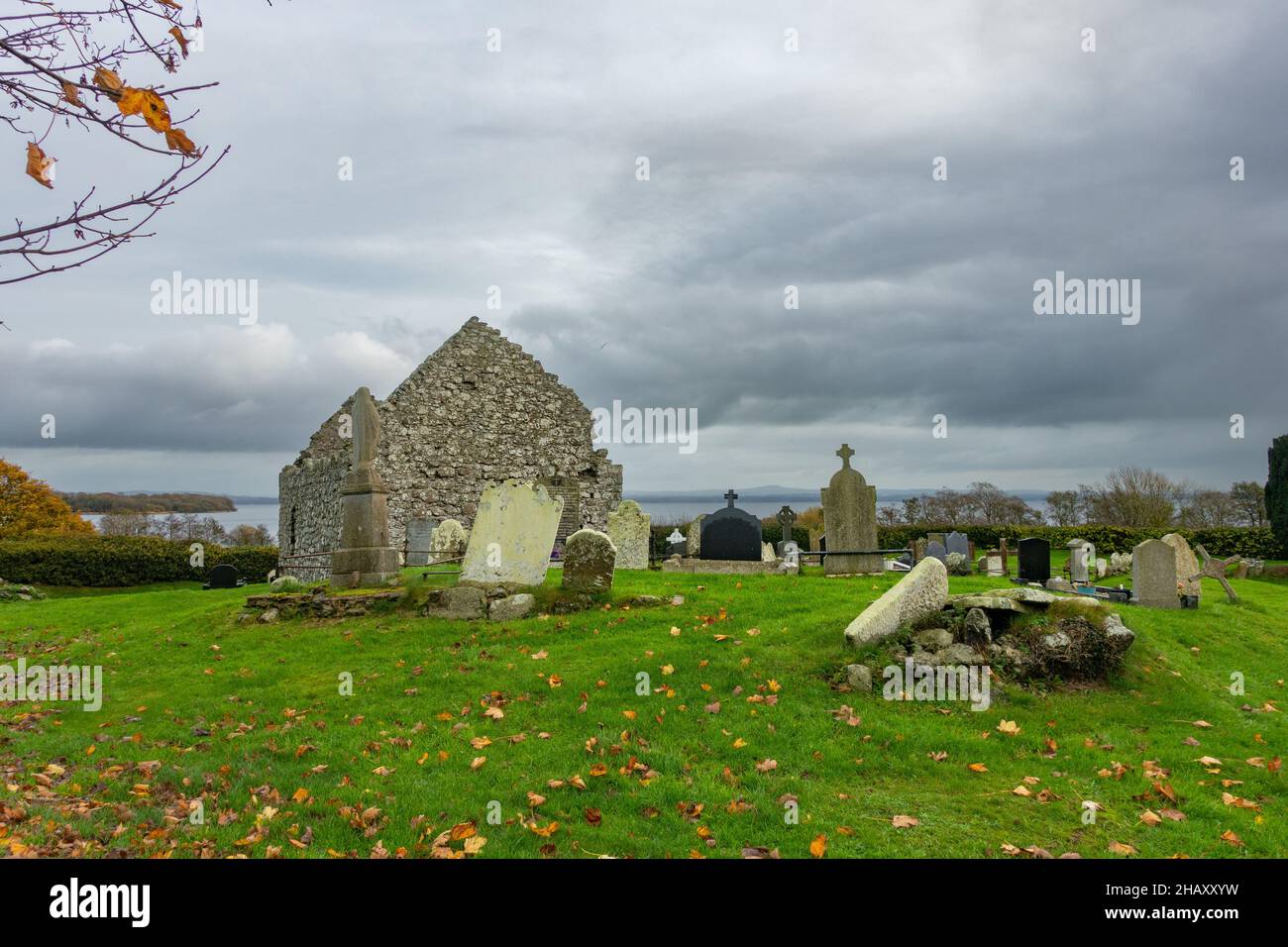 The ruins of a 13th century Church at Cranfield and St Olcan's Shrine on the shores of Lough Neagh at Churchtown Point, Antrim, Northern Ireland Stock Photo