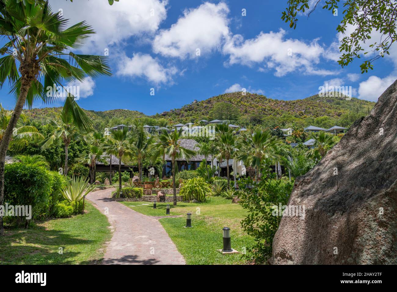 Raffles Hotel in tropical palm tree setting Anse Takamaka Praslin Island Seychelles Stock Photo