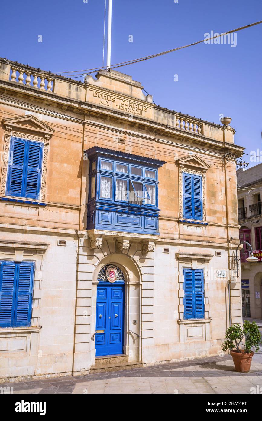 Typical Maltese residential building with brightly coloured timber
