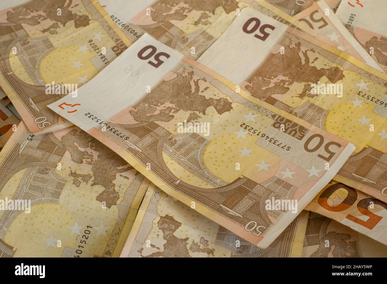 Euro banknotes bills heap,money earnings income,economy business Stock Photo