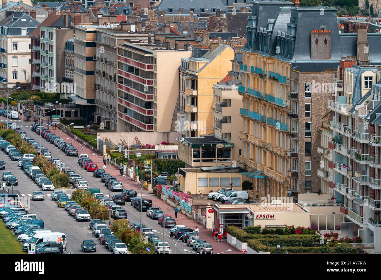 Dieppe, France - July 30, 2021: Cityscape of Dieppe with big residential buildings and cars parked along the streets Stock Photo