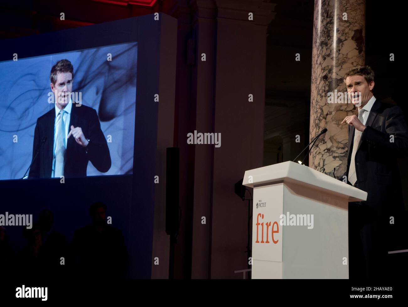 Director Tristan Hunt speaking at the Prix Pictet exhibition gala night at the V&A Victoria and Albert Museum in  London,England,UK Stock Photo