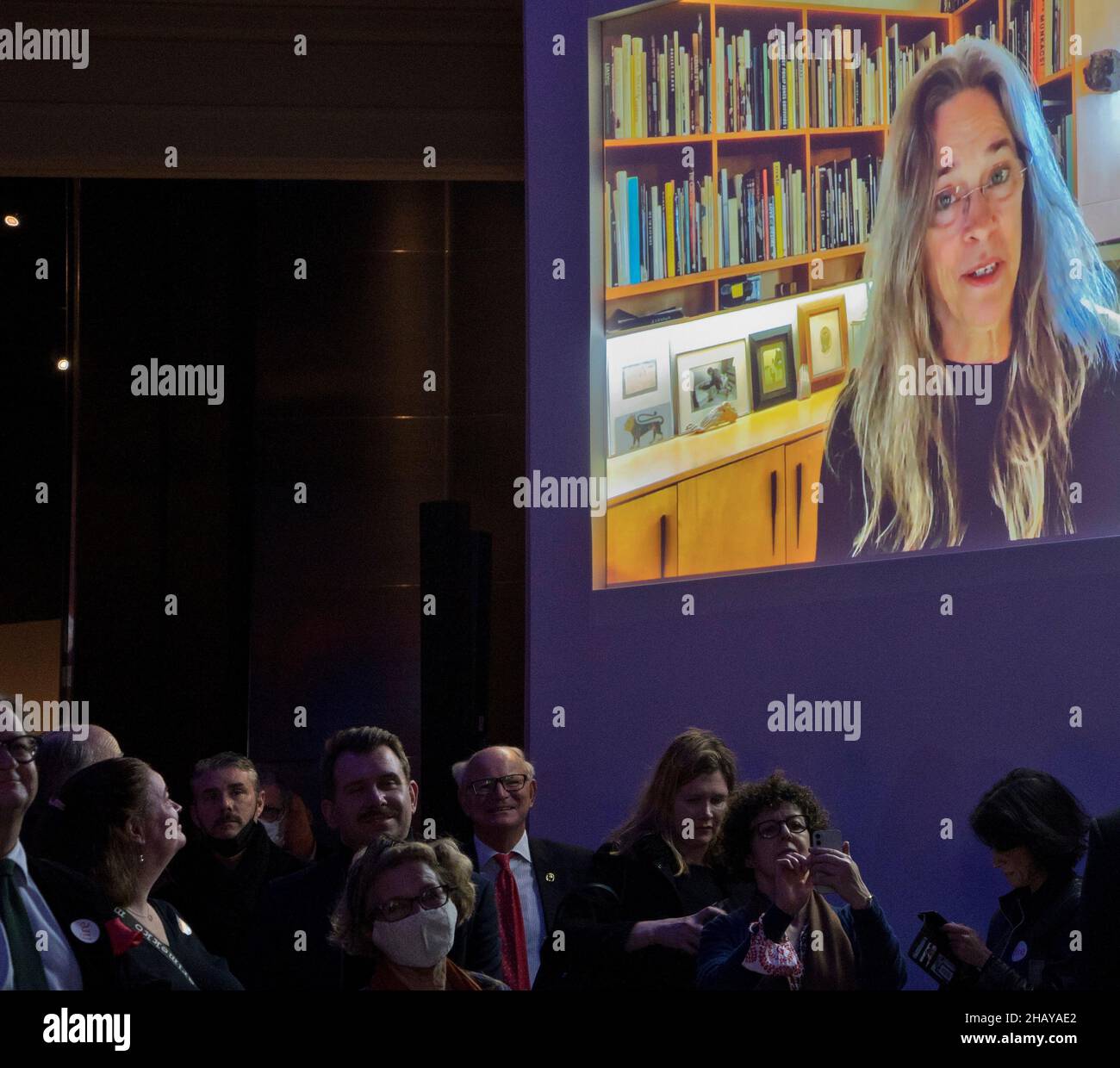 Winner of the Prix Pictet prize Sally Mann speaking from video link at the exhibition gala night at the V&A Victoria and Albert Museum in  London,England,UK Stock Photo