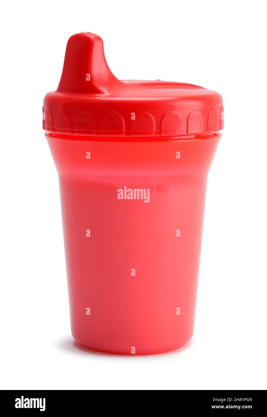 Red Baby Sip Cup Full Of Milk Cut Out on White. Stock Photo