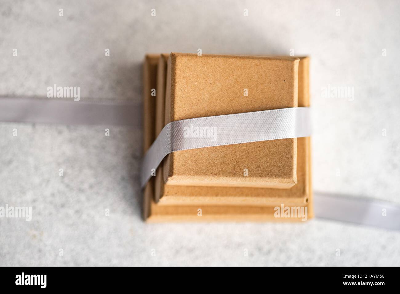 Stack of three gift boxes and a ribbon Stock Photo