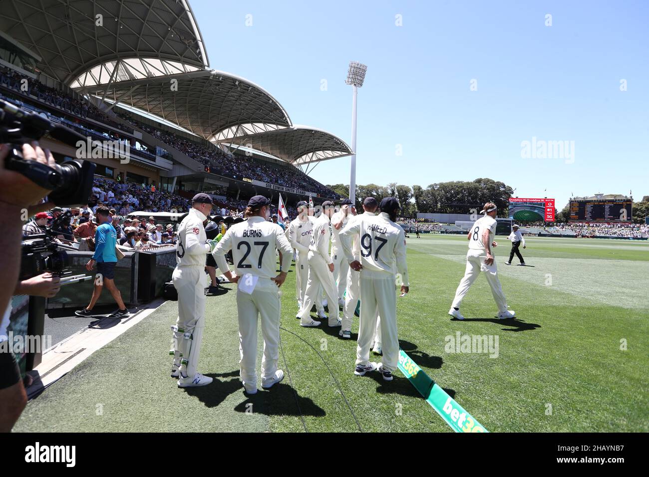 England's Staurt Broad leads out the team for his 150th test players take the field during day one of the second Ashes test at the Adelaide Oval, Adelaide. Picture date: Thursday December 16, 2021. Stock Photo