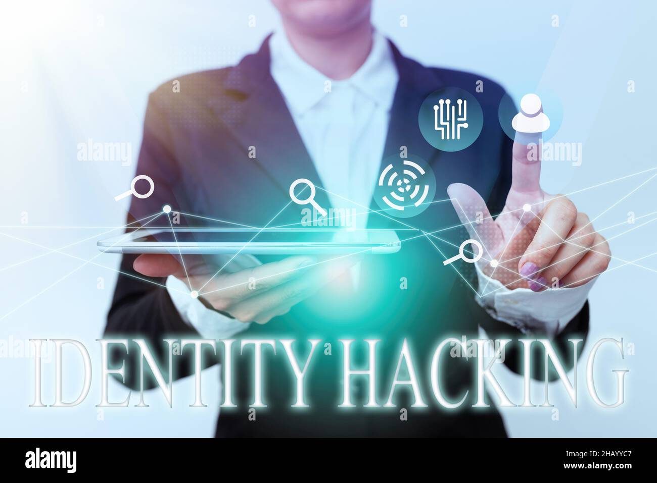 Text caption presenting Identity Hacking. Word for criminal that steal your personal information using malware Woman In Suit Holding Tablet Pointing Stock Photo