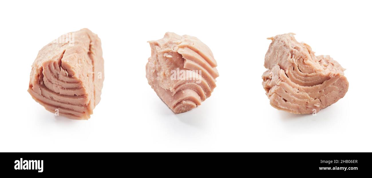 Sliced canned tuna fish pieces as ingredient for cooking recipe placed in row on white
