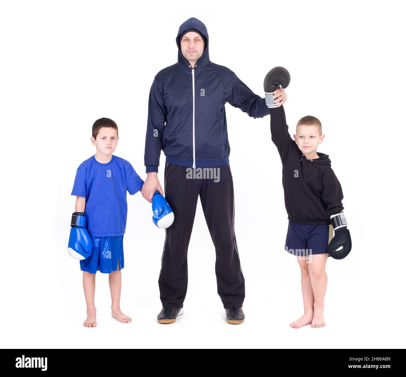 Kickboxing kids with instructor. Isolated on a white background. Studio shot Stock Photo