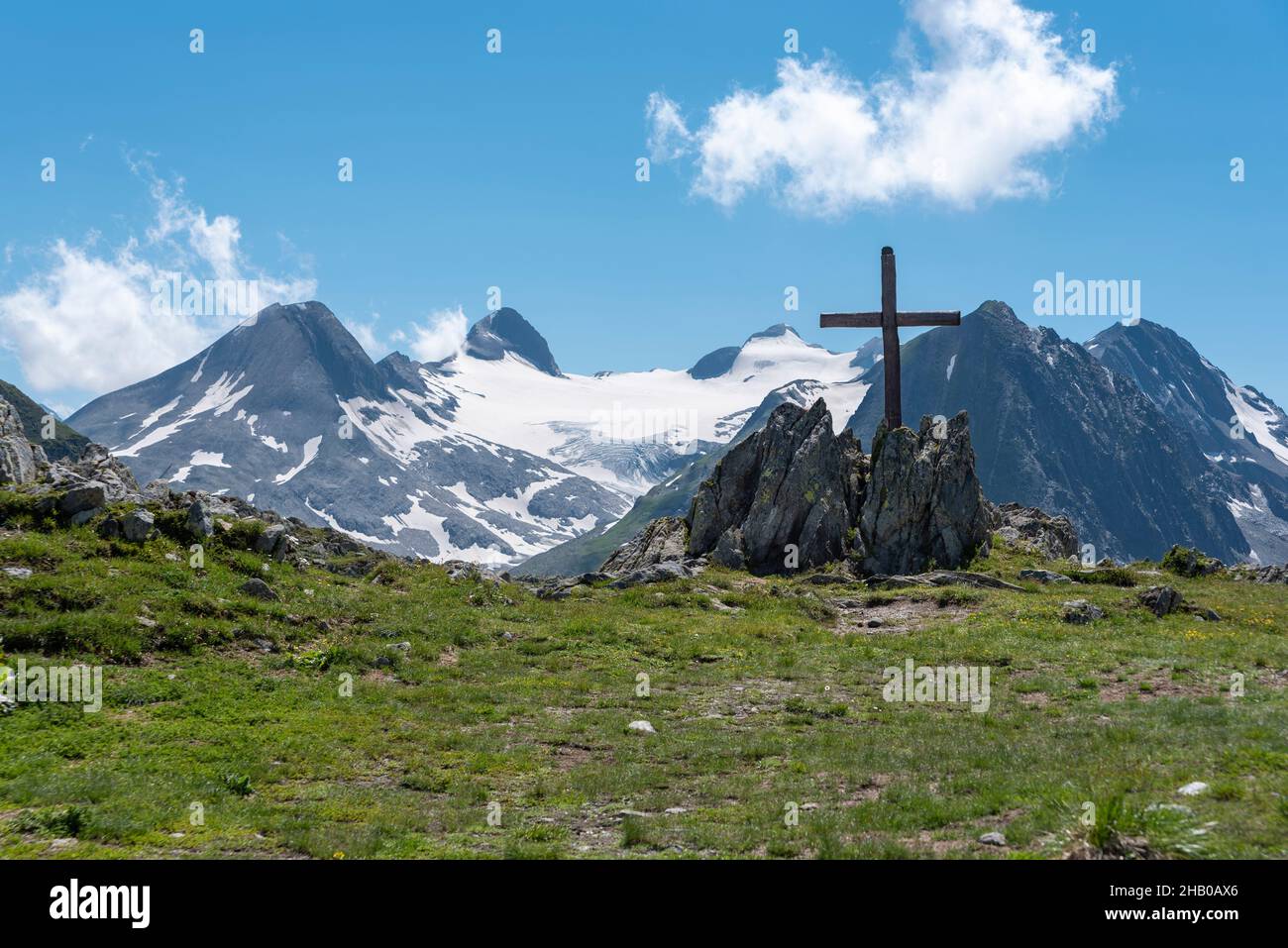 Nufenen cross in alpine landscape by the Nufenen Pass, Ulrichen, Valais, Switzerland, Europe Stock Photo