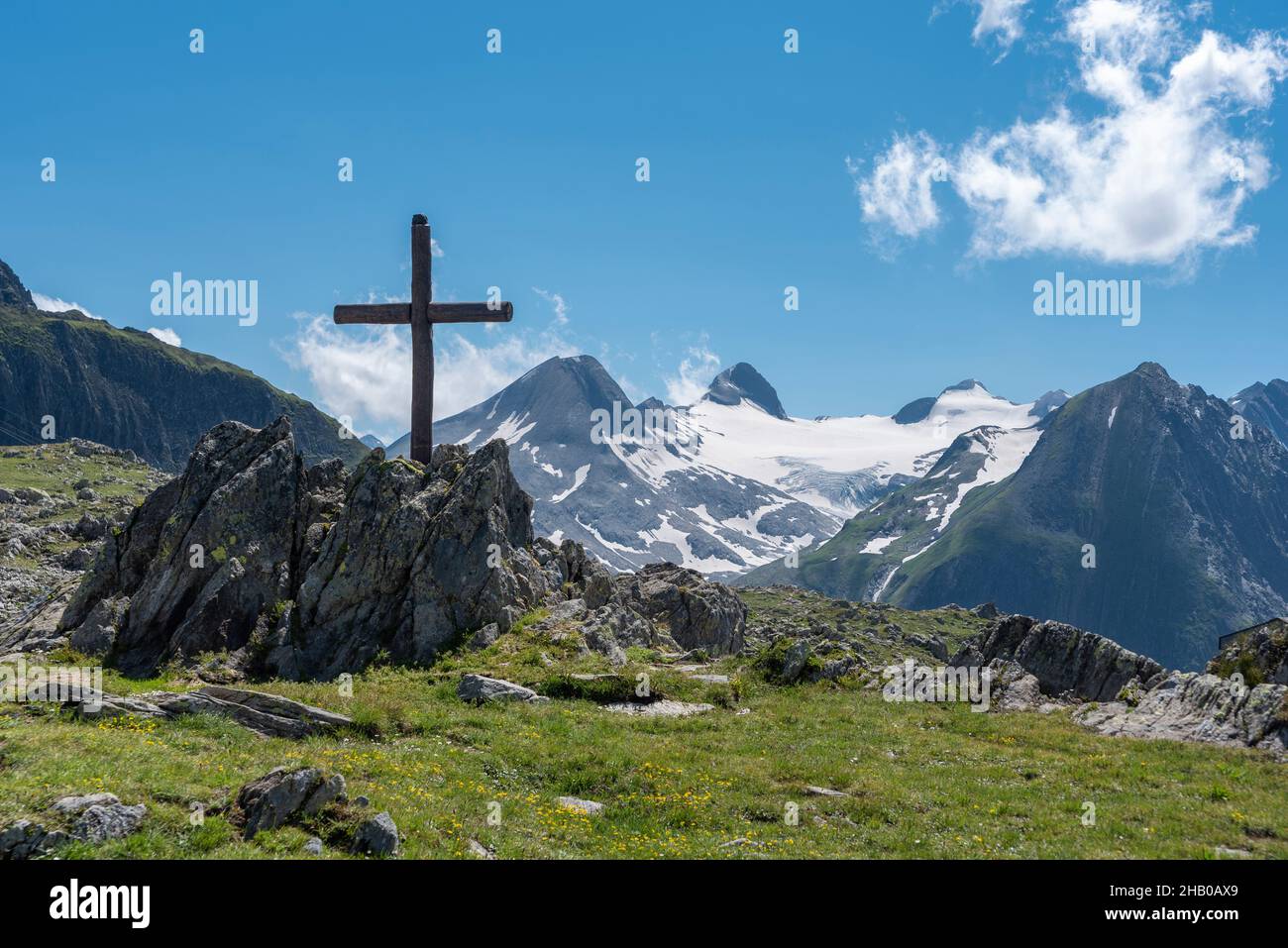 Nufenen cross in alpine landscape by the Nufenen Pass, Ulrichen, Valais, Switzerland, Europe Stock Photo