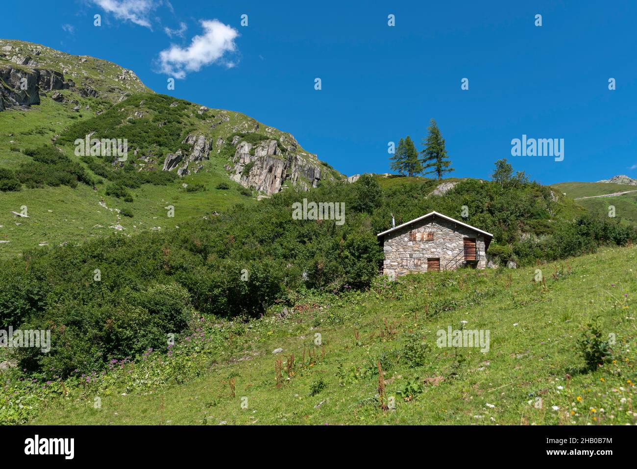 Mountain hut in alpine landscape near the hamlet of Ladstafel below the Nufenen Pass, Ulrichen, Valais, Switzerland, Europe Stock Photo