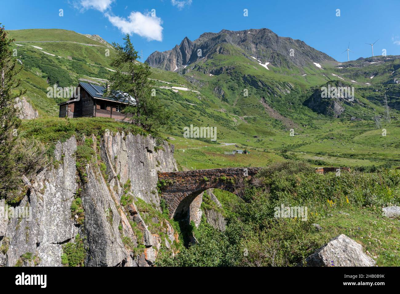 Alpine landscape with a historic arch bridge near the hamlet of Ladstafel below the Nufenen Pass, Ulrichen, Valais, Switzerland, Europe Stock Photo