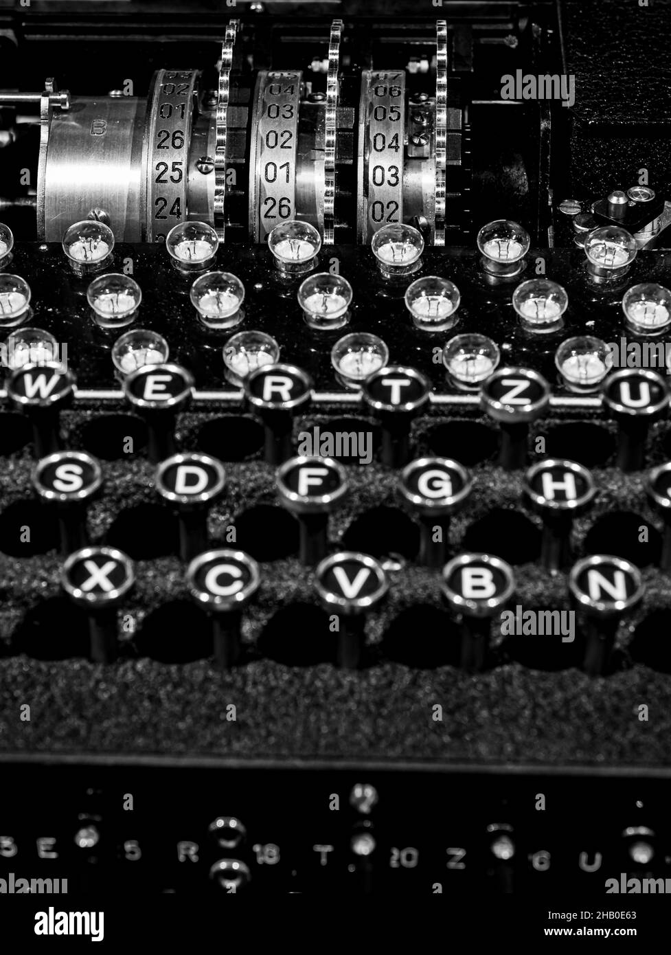 The plugboard, keyboard and rotors from a historic German World War 2 Enigma machine on display at Bletchley Park, Buckinghamshire. Stock Photo