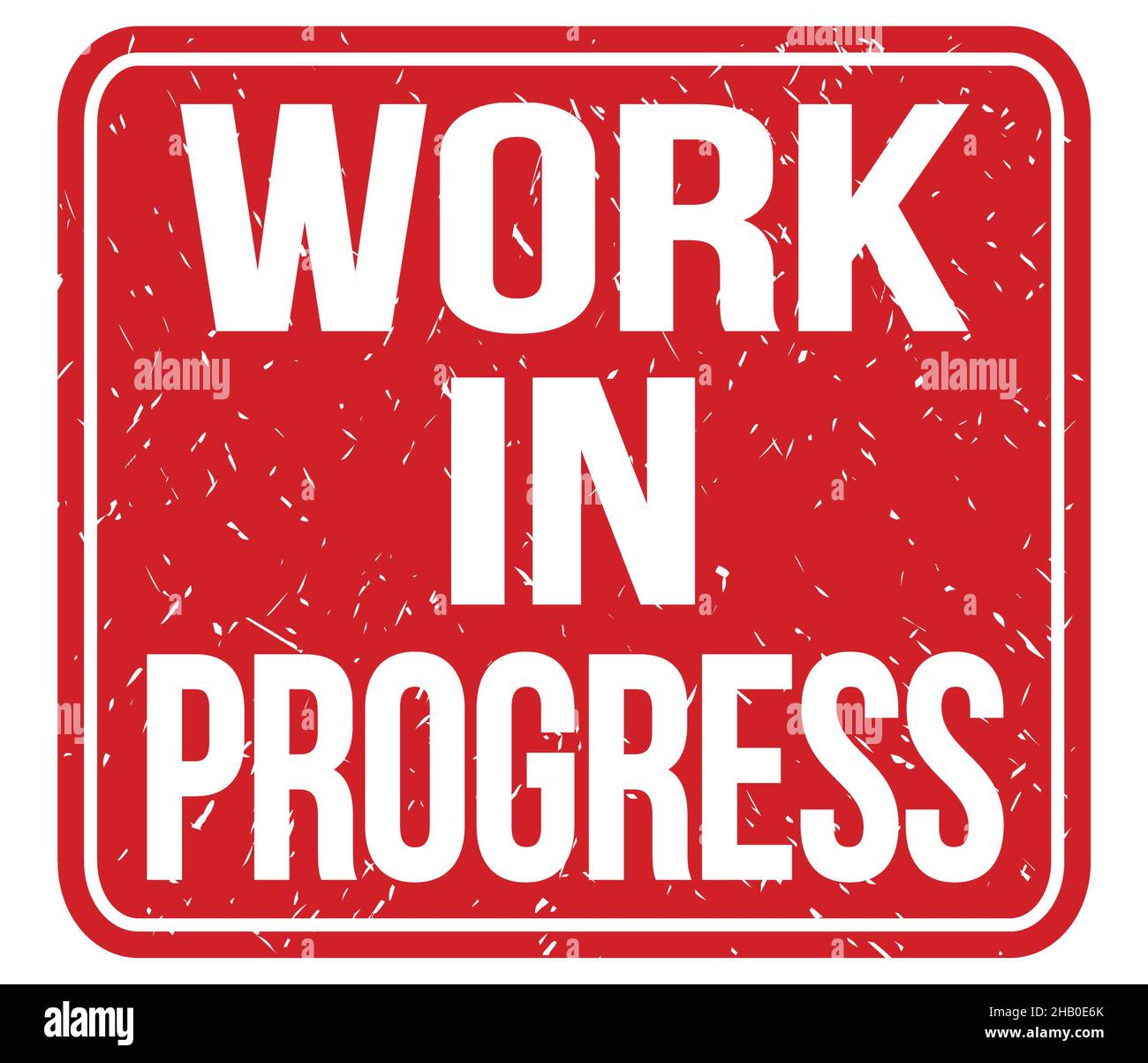 WORK IN PROGRESS, text written on red vintage stamp sign Stock Photo