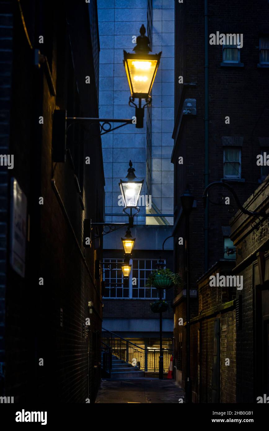 Street lamps in narrow street, London, England, UK Stock Photo Alamy