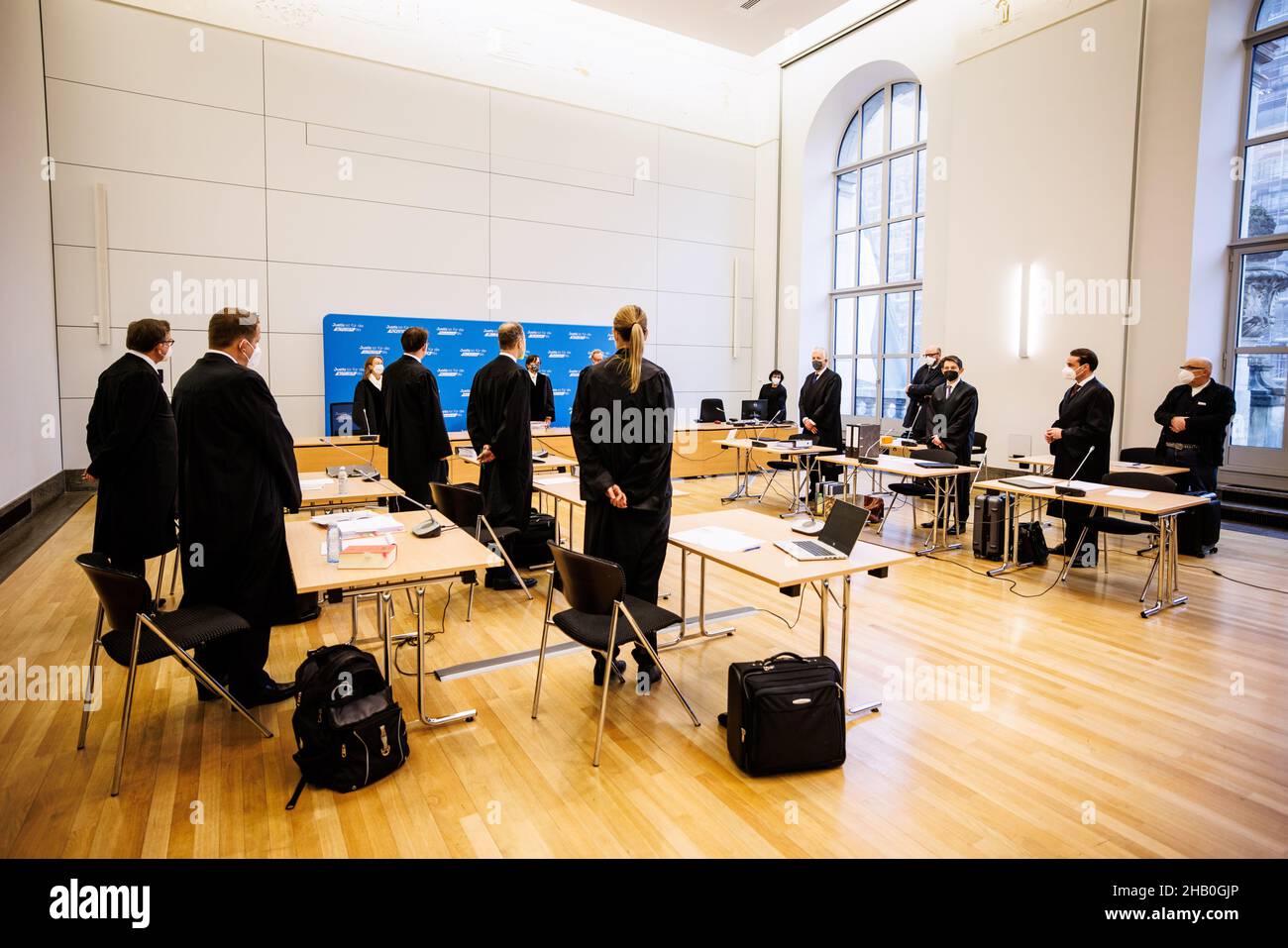 Munich, Germany. 16th Dec, 2021. The defendant side, represented by lawyers from Wirecard (l), is facing the plaintiff side, lawyers from Wirecard's insolvency administrator Jaffé, in a civil action for nullity before the Munich I Regional Court. In the lawsuit, the Wirecard insolvency administrator is seeking to have two annual balance sheets and resolutions of Wirecard's Annual General Meeting annulled. Credit: Matthias Balk/dpa/Alamy Live News Stock Photo