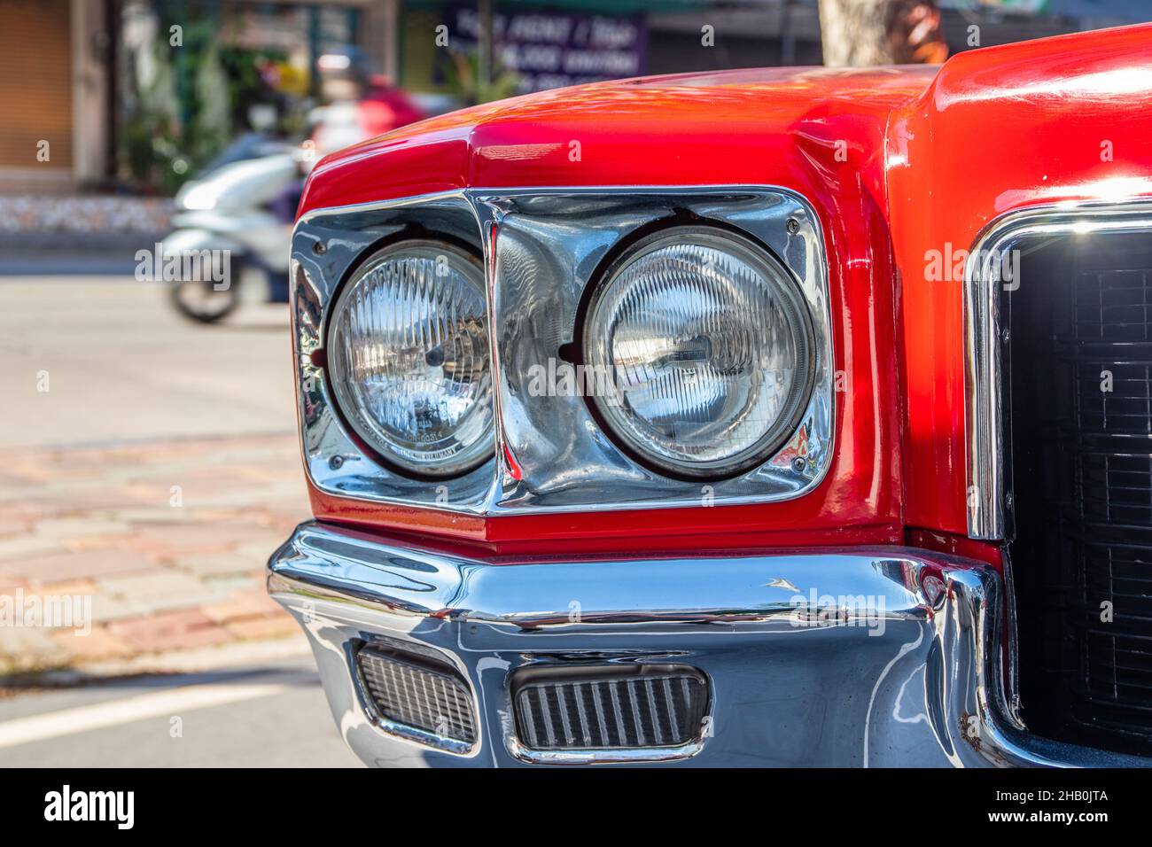 the Front headlights of a red classic car or Muscle- Car Stock Photo ...