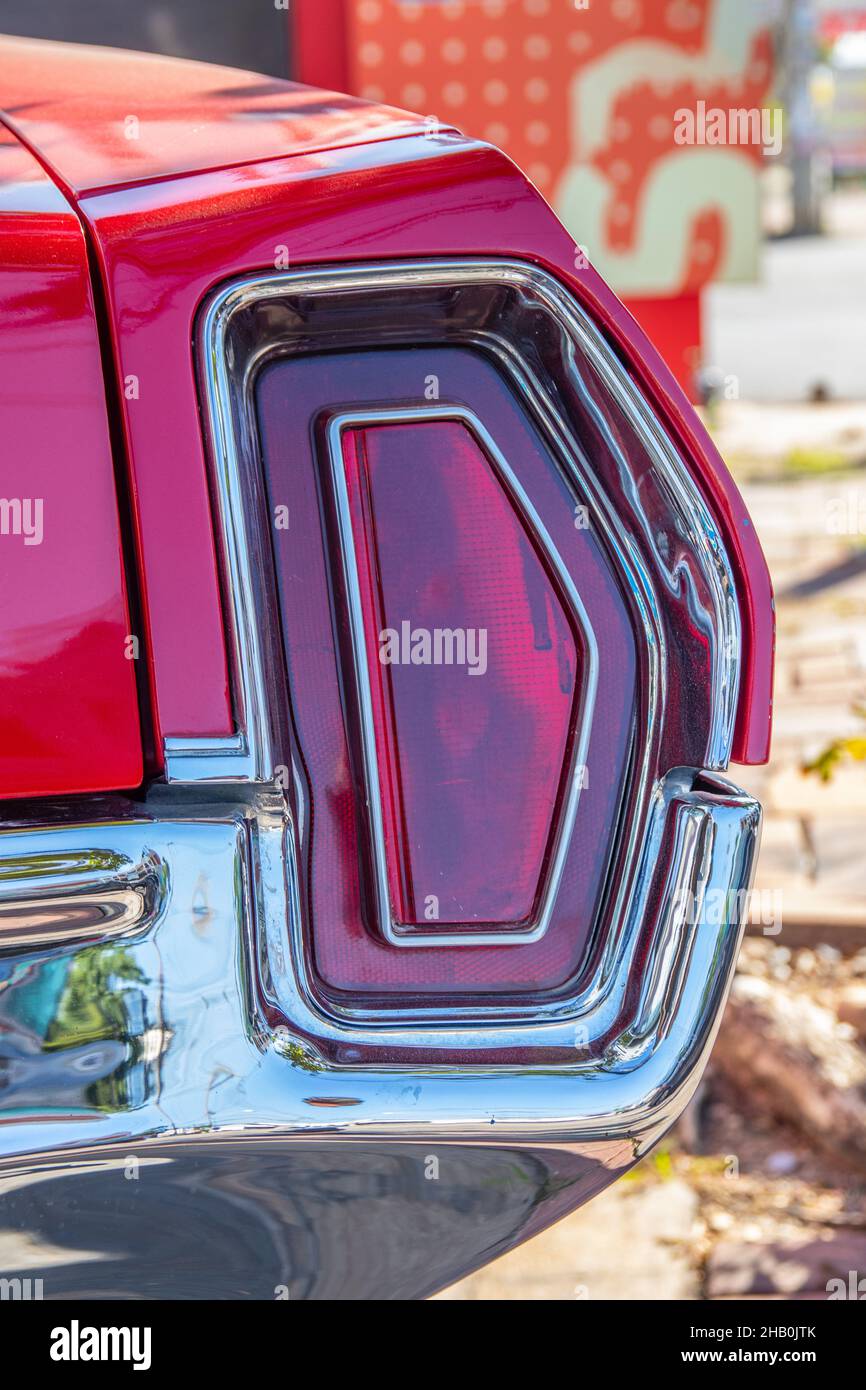 The red brake light or taillight of a red classic car or Muscle Car Stock Photo Alamy