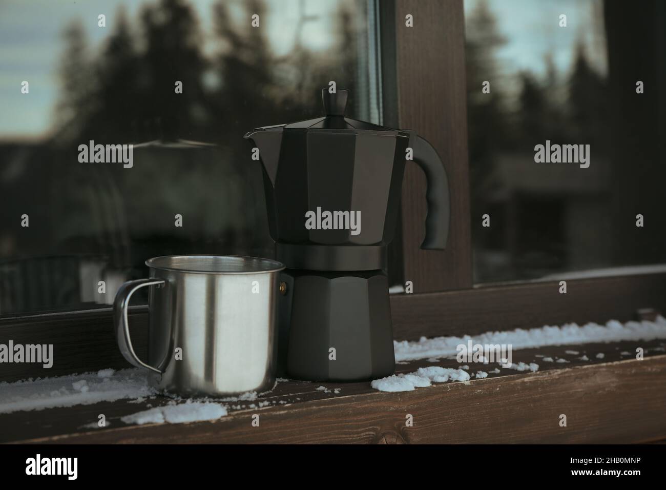 Espresso coffee in a Cuban coffee maker using a mini gas stove with a  propane tank on a single burner. A thunderstorm is brewing in the  background Stock Photo - Alamy