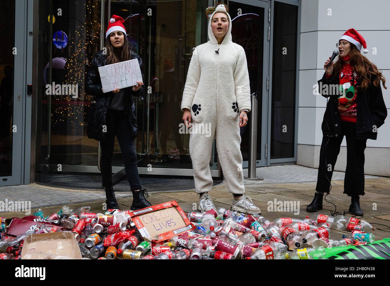 Protesting Coca Cola London, UK. 15th December, 2021. Climate activists from Extinction ...